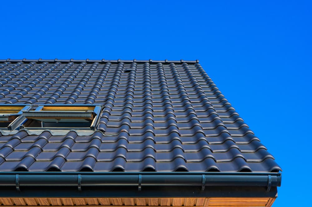 Residential roofline with gutter system close-up